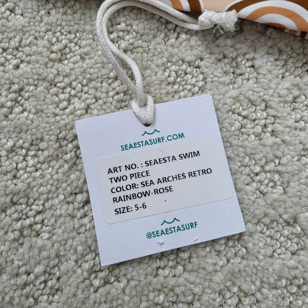 Seaesta Surf tag says